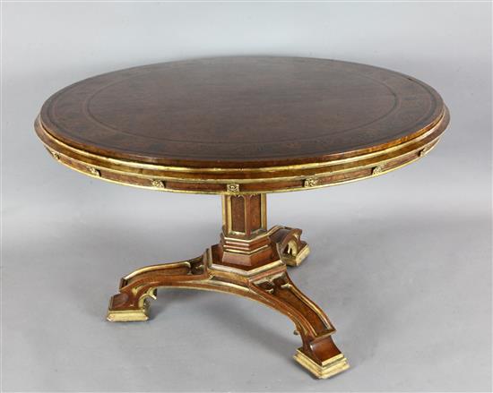 A.W.N. Pugin for Morel & Seddon. An important Gothic revival oak, pollard oak, parcel gilt marquetry centre table, Diam. 4ft 2in. H.2ft